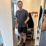 Peter smiling in his hallway while holding an Ortavio ArcCore insole